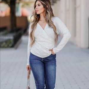 knit wrap-style top deep surplice v-neckline